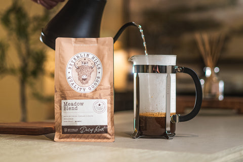 french-press-pouring-coffee-into-cup